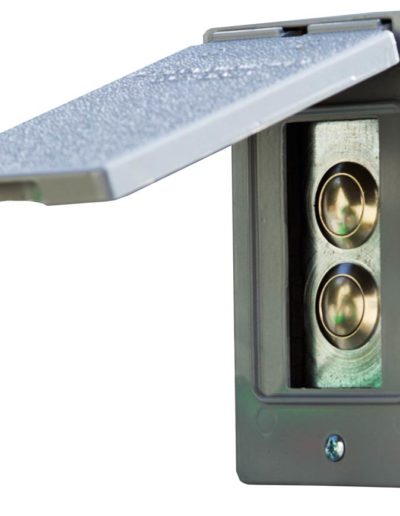 dumbwaiter push buttons with a weather cover over the top of them.