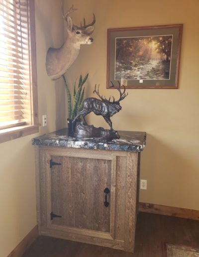 dumbwaiter tucked under a side table (door closed)