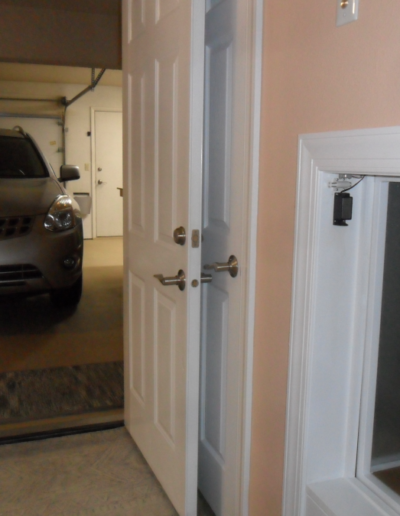 dumbwaiter car near the garage makes it easy to get groceries up from the car to the kitchen