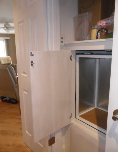 residential dumbwaiter in the pantry with the door open