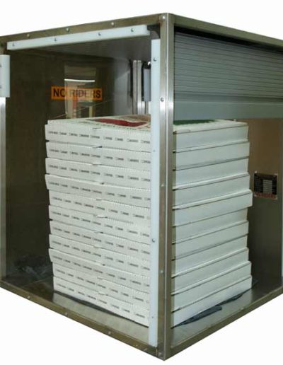 Commercial dumbwaiter Gates -- Roll Up Gate Open with stacks of food orders in car