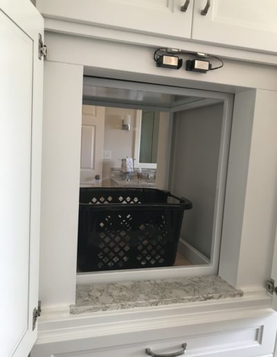 laundry basket in a residential dumbwaiter car