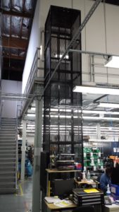 Mezzanine Lift Spanning Both Floors