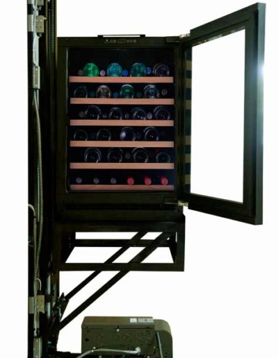 home dumbwaiter Wine Cellar -- Lift your favorite beverages up from the cellar with the touch of a button (front view door open)