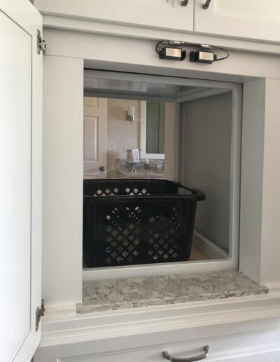laundry basket in a residential dumbwaiter car.